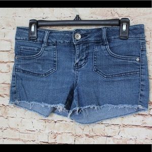 L.E.I. | low rise blue jean raw hem shorts